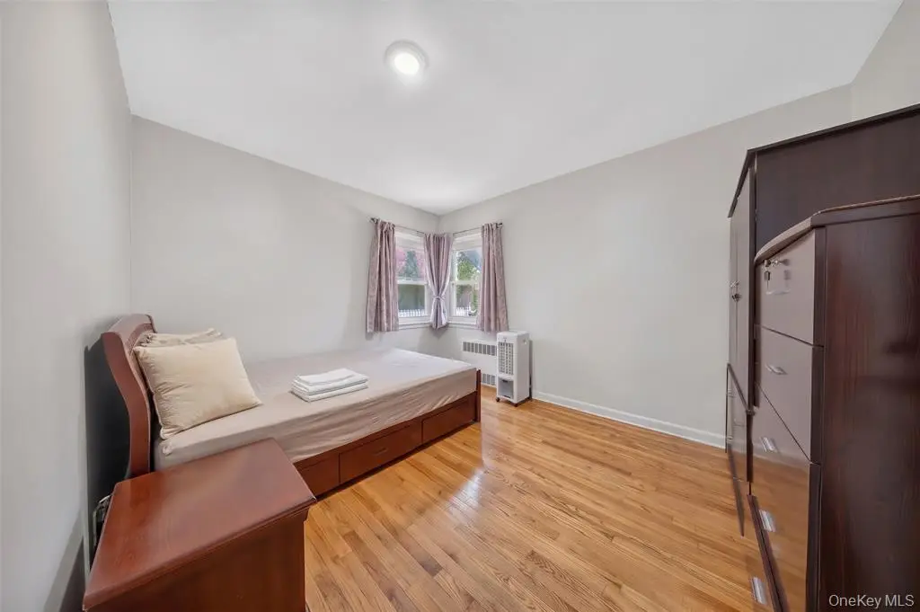 Upper-level bedroom with dormer windows