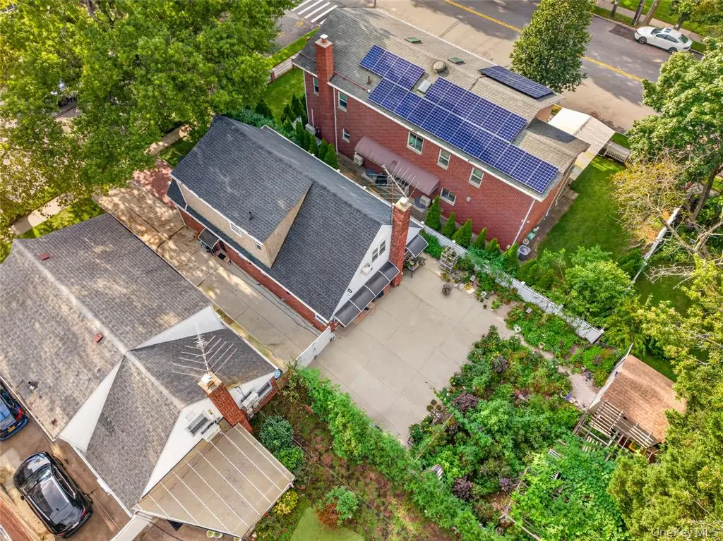 Aerial view of the Oakland Gardens property and neighboring lots