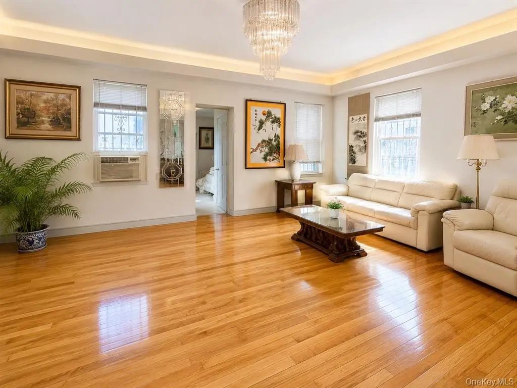 Virtually staged upper-level living room in the mixed-use building