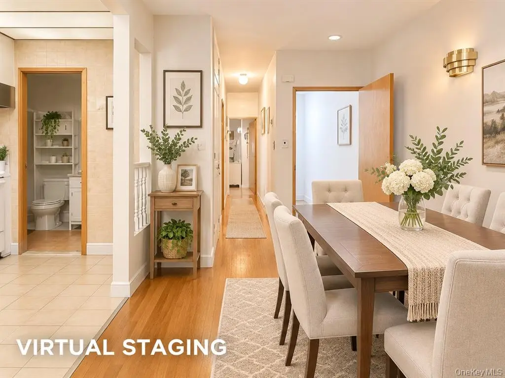 Virtually staged dining area in the upper-level residence