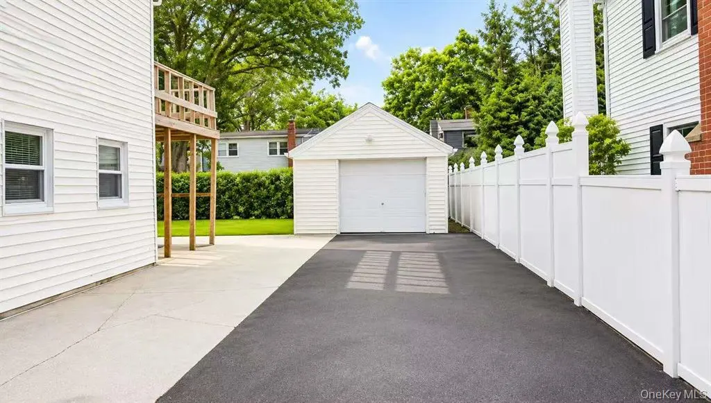 Private driveway leading to the detached garage
