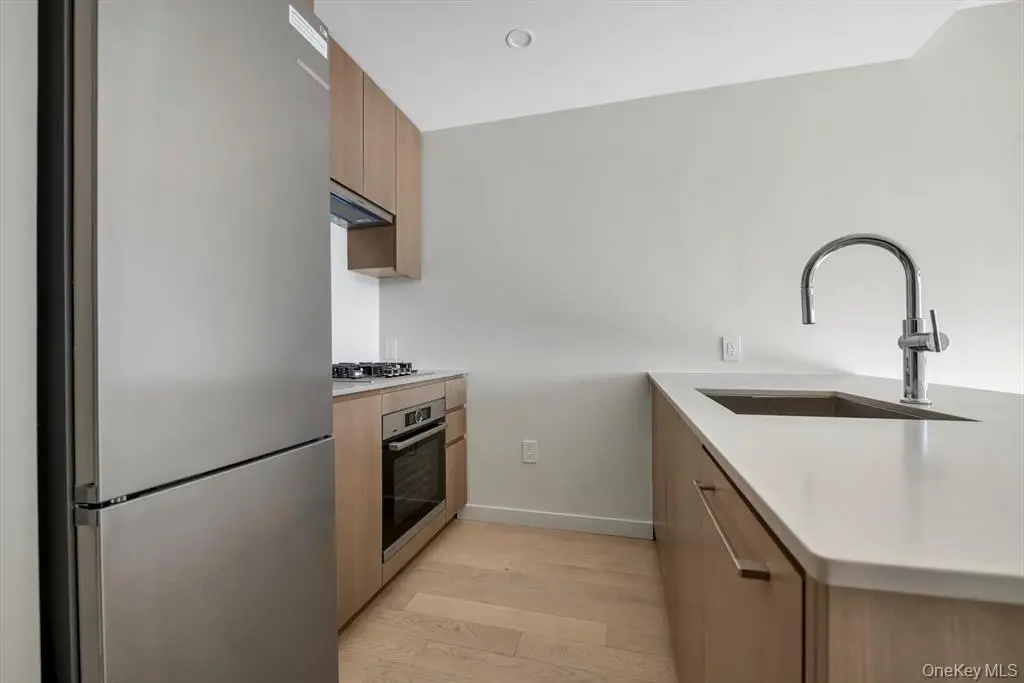 Modern open kitchen in the Longfield one-bedroom condominium