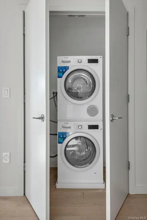 In-unit stacked washer and dryer