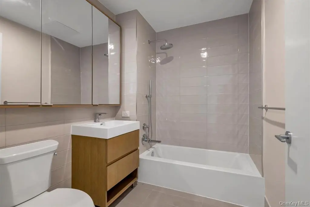 Modern bathroom with vanity and tub