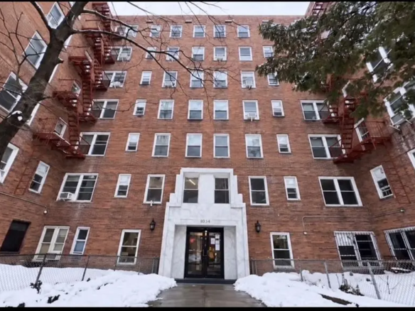 Flushing renovated studio co-op — brick cooperative building exterior